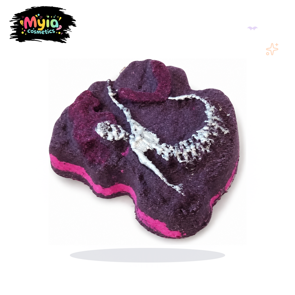 Mermaid Bones 156g pink and purple mermaid skeleton bath bomb in Candyfloss Chaos scent by Myia Cosmetics — clean white-background hero image.